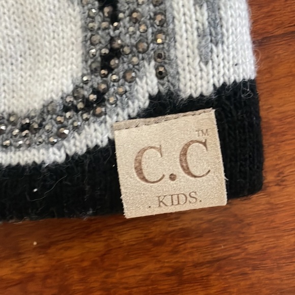 C.C kids hat with fuzzy top. - Picture 3 of 3